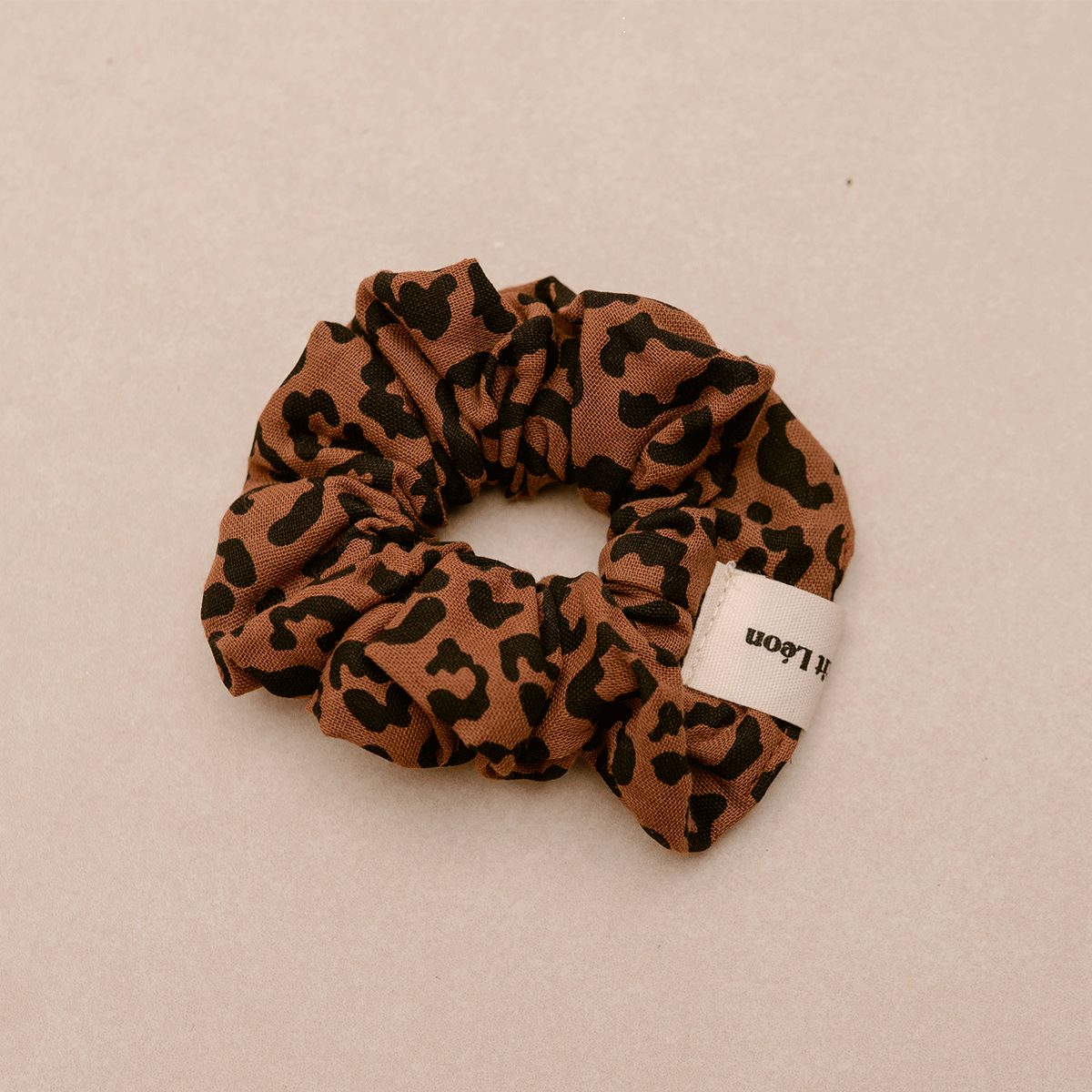 CHOUCHOU GAZE DE COTON LEOPARD FONCE
